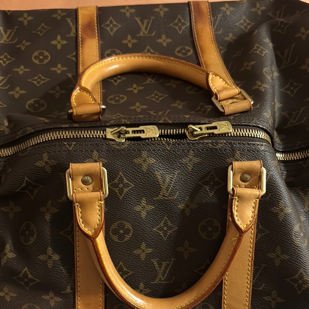Authentic Louis Vuitton Luxury Brown Monogram duffel bag